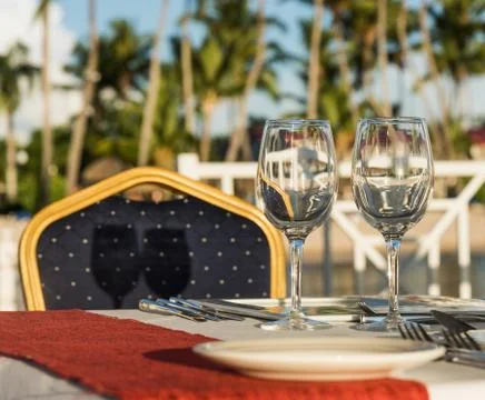 Festive table in the gazebo at sunset Fotos Stock