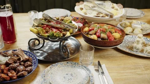 Festive Table with Grilled Meat and Traditional Dishes Stock Footage 301529717
