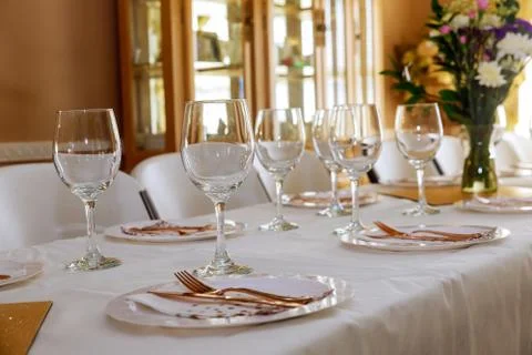 Festive table served for dinner or party in living room. Stock Photos