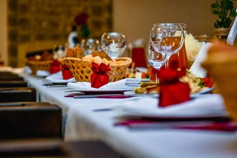 Festive table setting with bread and wine glasses Stock Photos
