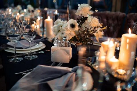 Festive table setting candles for wedding party Stock Photos