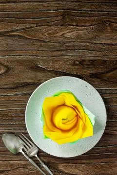 Festive table setting. Culinary background with napkin and empty stove. Stock Photos