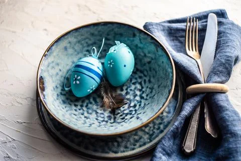 Festive table setting for easter dinner Stock Photos