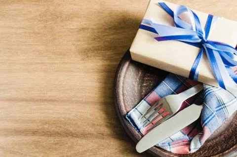 Festive Table Setting with Present. 스톡 사진