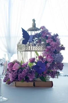 Festive table setting in the restaurant with flowers. Wedding decor. Stock Photos