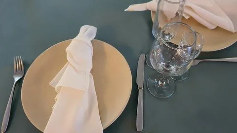 Festive table setting in the restaurant. Wedding preparations. Selective focu Stock Photos