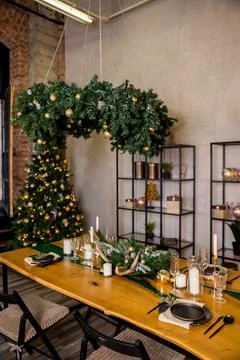 Festive table setting with rustic decorations for Christmas. New Year holidays Stock Photos