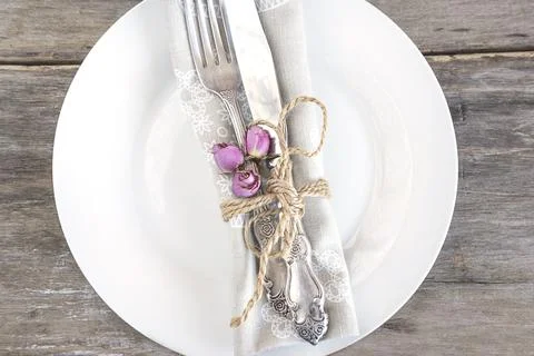 Festive table setting on rustic wooden background Stock Photos