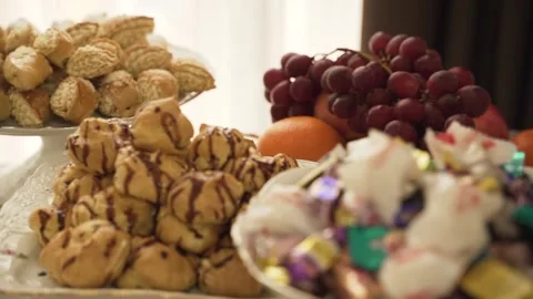 Festive table with sweet dishes Stock Footage 152146294