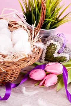 Festive traditional easter egg decoration ribbon and tulips Stock Photos