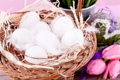 Festive traditional easter egg decoration ribbon and tulips Stock Photos