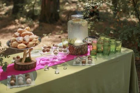 Festive wedding table, decorated with sweets and drinks Stock Photos