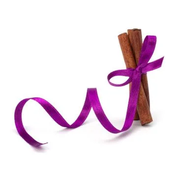 Festive wrapped cinnamon sticks Stock Photos