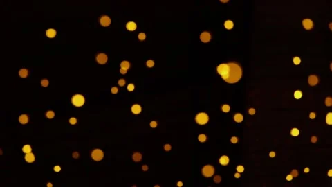 Festive yellow defocus light on dark background Stock Footage 233209576