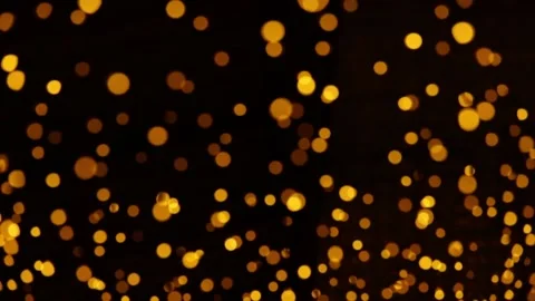 Festive yellow defocus light on dark background Video stock 234652451