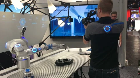 Festo presenting bionic workplace on Messe fair in Hannover, Germany Stock Footage 89510058