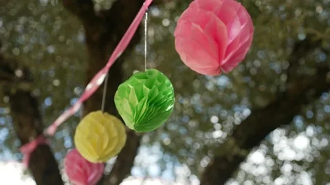 Festoons hanging on the tree Stock Footage 178934835