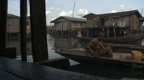 Fetching drinking water, Makoko floating slum Stock Footage 38386728