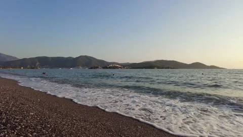 Fethiye calis Beach beach with vacationing. Turkey Stock Footage 169546383