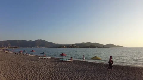 Fethiye calis Beach beach with vacationing. Turkey Stock Footage 169546385