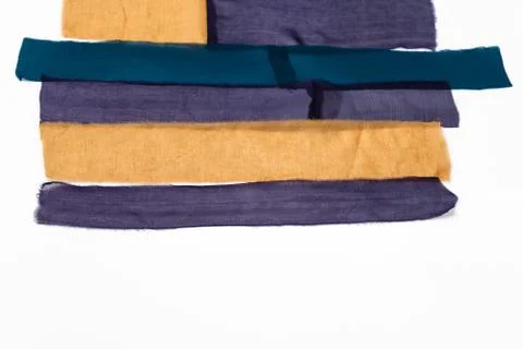 Few arranged strips of fabrics for patchwork scarf Stock Photos