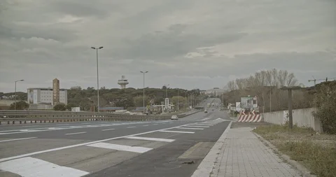 A few car on empty road in eur Neighborhood, Rome Stock Footage 127539368