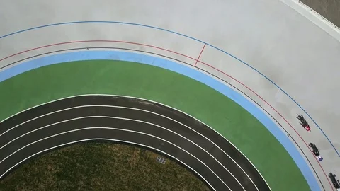 Few cyclists riding bicycles on cycle track Stock Footage 100140832