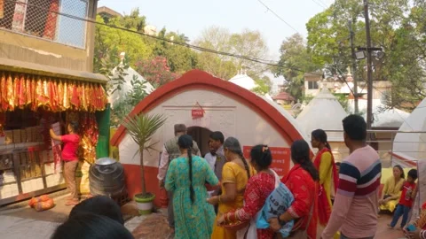 Few devotes going for puja at sacred Hindu Shrine in Assam Stock-Footage 249033999