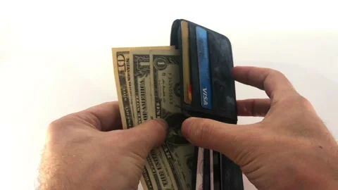 Few dollars in man's hand and money wallet Stock Footage 146756306