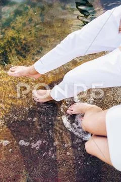 Few feet in the water Stock Photos
