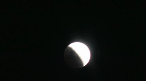 A few minute timelapse of a partial luna eclipse. Stock Footage 7767035