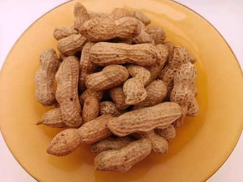 A few nuts in a bowl Stock Photos