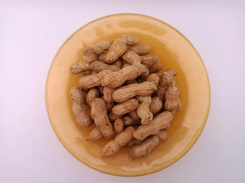 A few nuts in a bowl Stock Photos