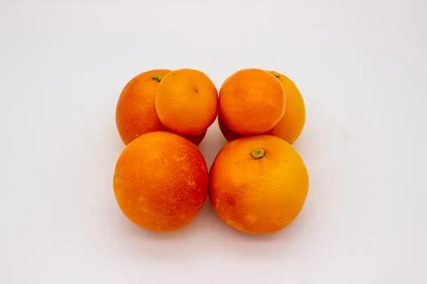 Few oranges on white background Stock Photos