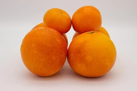 Few oranges on white background Stock Photos