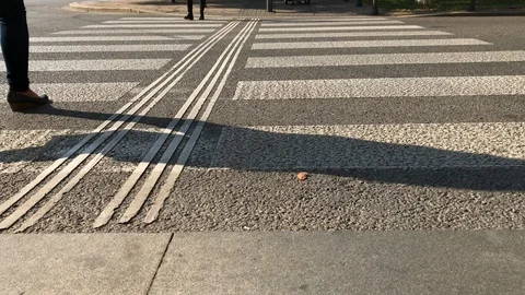 Few pedestrian cross over small road by zebra Stock Footage 97435340