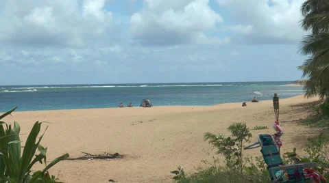 Few people only at idyllic beach on Kauai Island,Hawaii Stock Footage 41501034