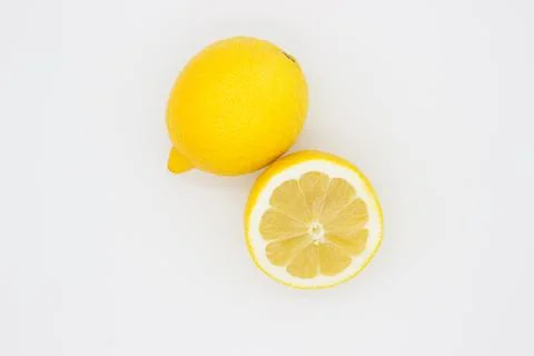 Few ripe lemons on light background Stock Photos
