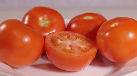 Few ripe tomatoes Stock Footage 68592304