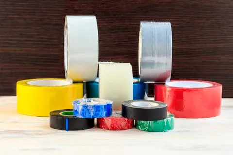 A few rolls of duct tape stack of electrical tape stand nearby. have toning.  Stock Photos