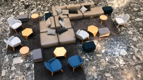 Few sofas, coloured armchairs, seats and low tables in office area, view from Video stock 99468113