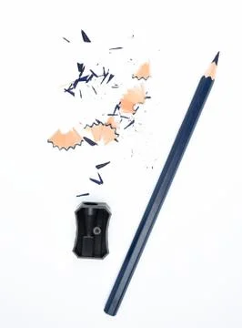 Few study materials containing a blue pencil and a black color plastic sharpe Stock Photos