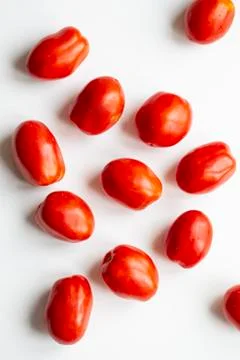 A few tomatoes closeup on white background Stock Photos