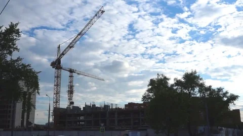 Few tower cranes working on a construction site during the day Stock Footage 69173054