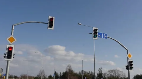 Few traffic lights time lapse with fast moving wagon and car. Stock Footage 47432166