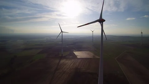 A few windmills from behind with cloudy sky Stock Footage 93191105