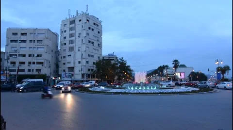 Fez Morocco twilight exposure at traffic circle Main Street  Avenue Hassan II Stock-Footage 47341884