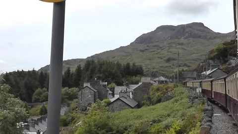 Ffestiniog Railway - view from window passing trackside signage Stock Footage 79960587