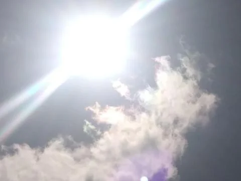 FHD bright sun rays across a cloudy gray sky Tampa Florida Stock-Fotos