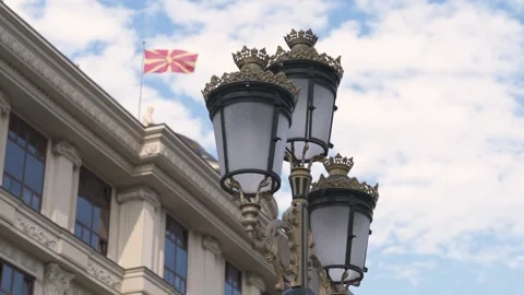FHD Light pole with Macedonian Flag and blue sky with white clouds Stock Footage 235022927